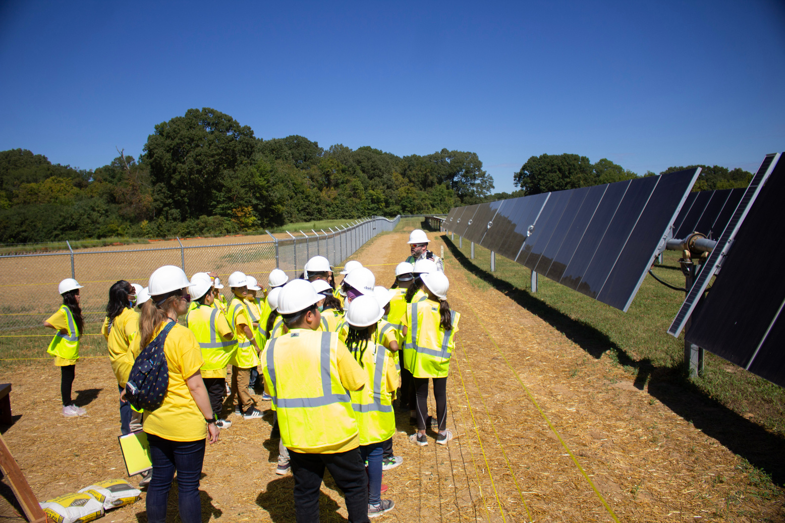 Students going on a tour of the Jackson, TN Solar Farm